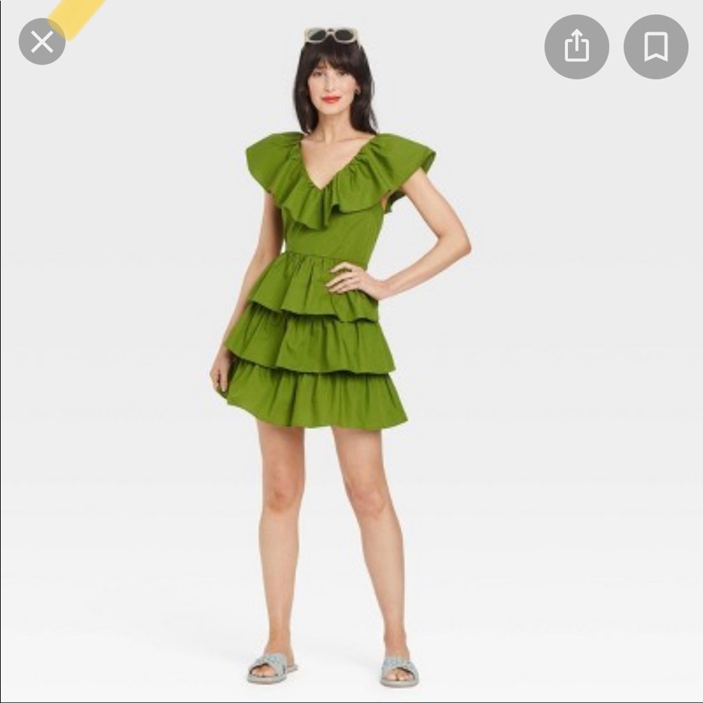 Green ruffled mini dress